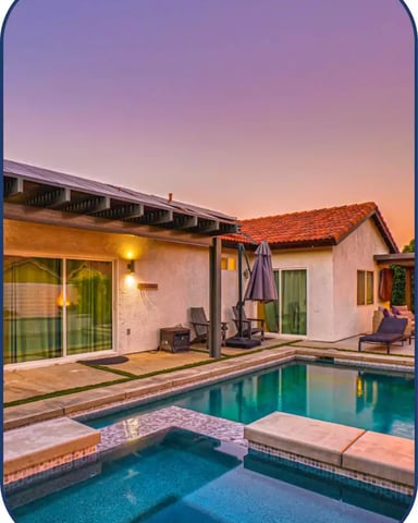 Palm Springs vacation rental with private pool at dusk