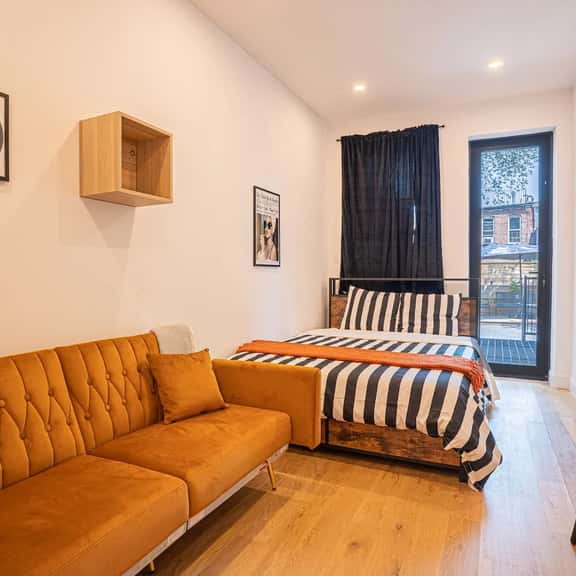 Modern 2BR & Basement Brooklyn Stay and Backyard - Image 1