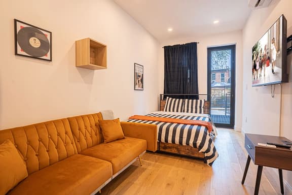 Modern 2BR & Basement Brooklyn Stay and Backyard - Image 1
