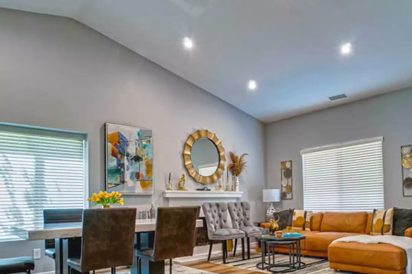 Bright, fully furnished living and dining area in a DreamCityStays home